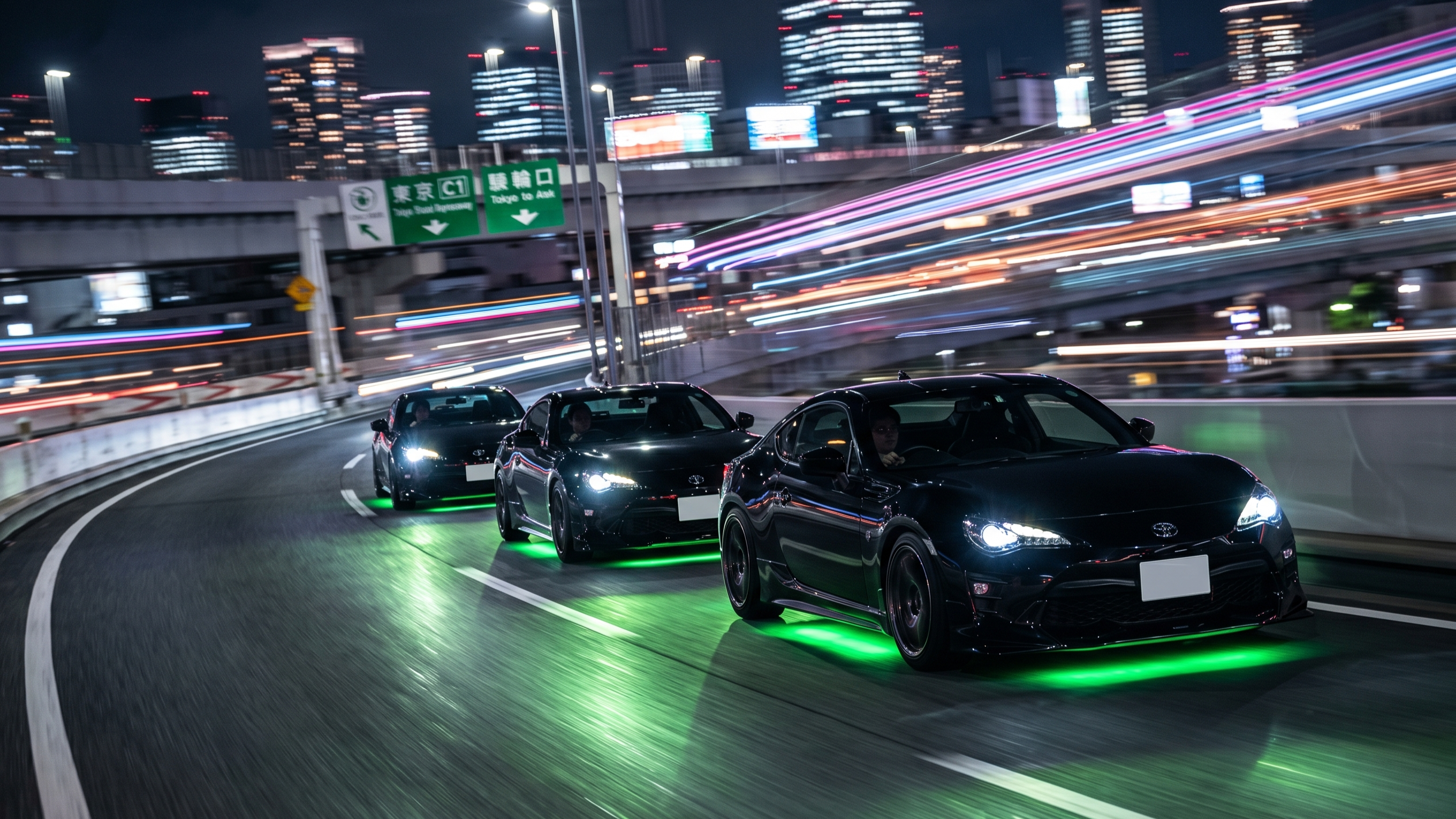 Professional rolling shot of a premium JDM sports car convoy executing a perfect curve on the Tokyo Bayshore Route at night.